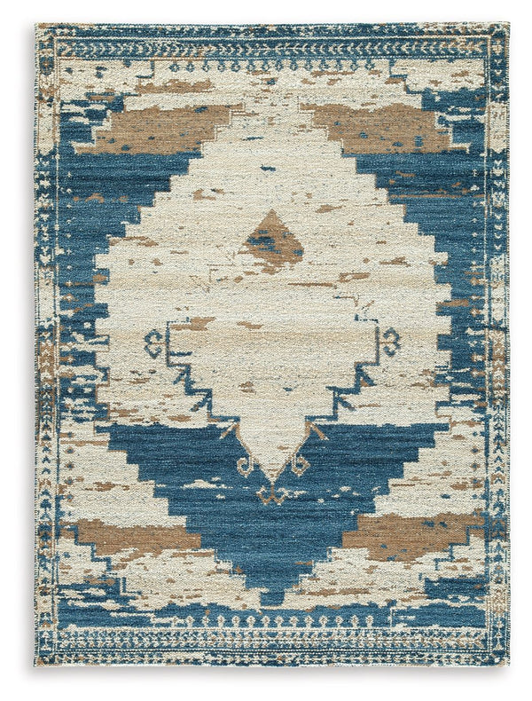 Invite a casual boho vibe into your space. Showcasing a distressed medallion design, this rug can mix and match with other accents to curate an eclectic aesthetic. Its blue, brown and tan palette exudes a relaxed feel, completing your living room or bedro
