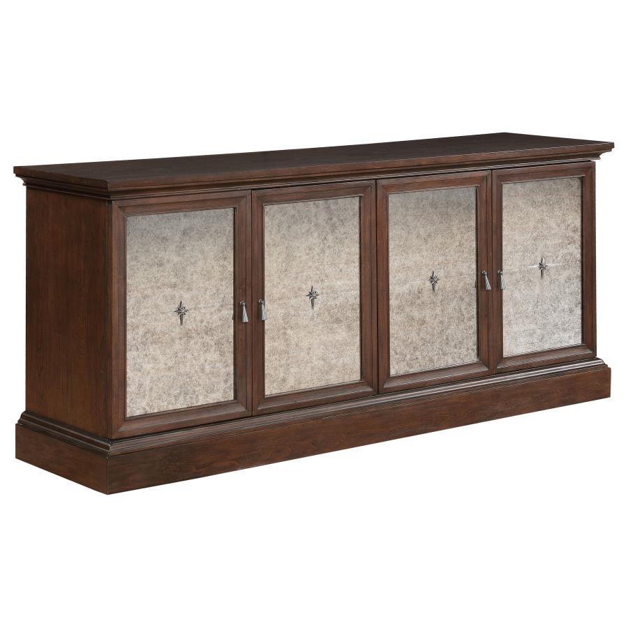 Complete your Brockway collection dining ensemble with the stylish, refined presence of this wood server. Offering four mirrored doors, the server opens to reveal superb storage space for dinner and serveware. Crafted in wood, the sideboard features a ric