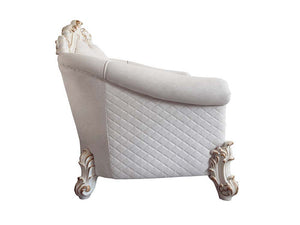  our new interpretation of Vendome II is donned. The Vendome II sofa-'s light gray fabric is grand and classy with crystal like button tufting on the back in a crackled gold p