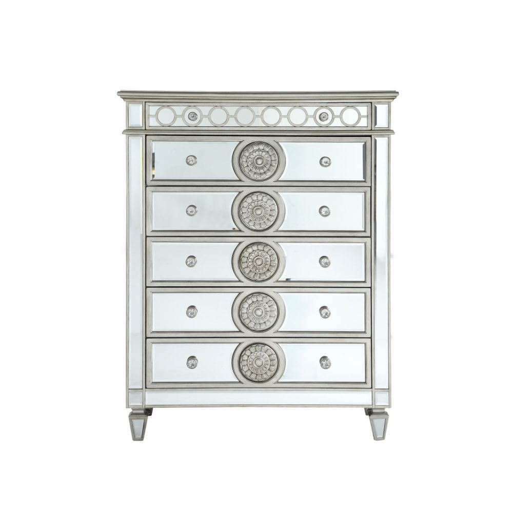 The Varian mirror provides a commanding presence in any room. Add a dash of glam to your bedroom with this Varian mirror. This gorgeous mirror is accented with raised geometric patterns and mirror finish. This fashionable chest will fuse with the surround