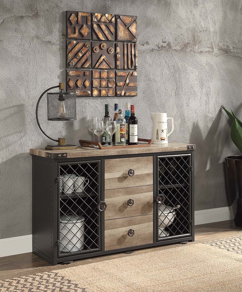 Featuring a rectangular wooden tabletop in an oak finish the Edina dining table merges farmhouse and industrial elements for the ideal dining table for the modern home. Metal corner protectors with rivets that elevate the tabletop. The metal pipe trestle 