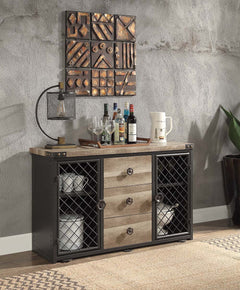 Featuring a rectangular wooden tabletop in an oak finish the Edina dining table merges farmhouse and industrial elements for the ideal dining table for the modern home. Metal corner protectors with rivets that elevate the tabletop. The metal pipe trestle 