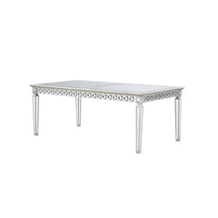 Let the Varian dining collection reflect your brilliant style! This chic set features a rectangular table accented with a beveled mirror trim in a geometric design. The matching chairs are upholstered in a lustrous blue fabric and supported by elegantly t