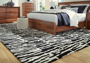  its abstract motif and rich neutral colors create the perfect pop of interest.<br/><br/><b>Product Features</b><ul><li>Made of polyester</li><li>Machine woven</li><li>