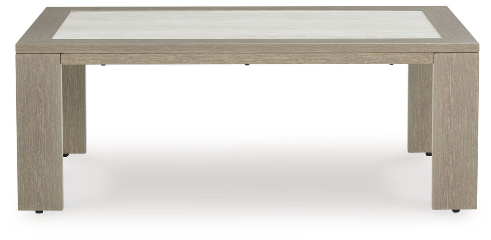 This outdoor coffee table is just what you need to get your outdoor party started. Though it looks remarkably like wood, its durable frame is perfectly suited for alfresco living. A striking tabletop with the look of natural stone serves up plenty of room