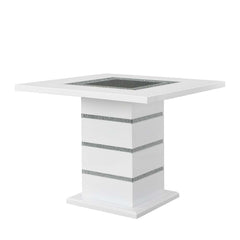 Perfect for a kitchen nook or a smaller dining space, the Elizaveta counter height dining table will fulfill all your dining needs. The white high gloss finish blends in perfectly with the glimmering faux diamond inlay base. The tabletop features silver a