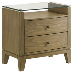 This nightstand is a perfect blend of style and functionality, featuring a natural pine finish that exudes a warm and inviting aura. Its top drawer offers cord management access, ideal for recharging devices conveniently. The piece-'s softly curved fronts