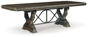  this dining room collection is nothing short of stunning. A choice blend of materials is accented by detailed ornamental appliques large scaled decorative pila