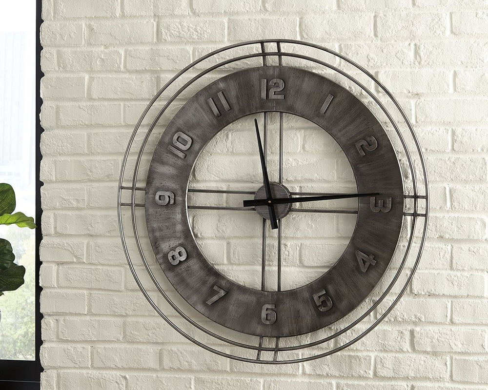 Merging an antiqued gray finish with a minimalist chic open design, this wall clock offers a timeless sense of style that can suit vintage-inspired and contemporary spaces equally well. Raised numbers give a simply striking look added dimension.<br/><br/>