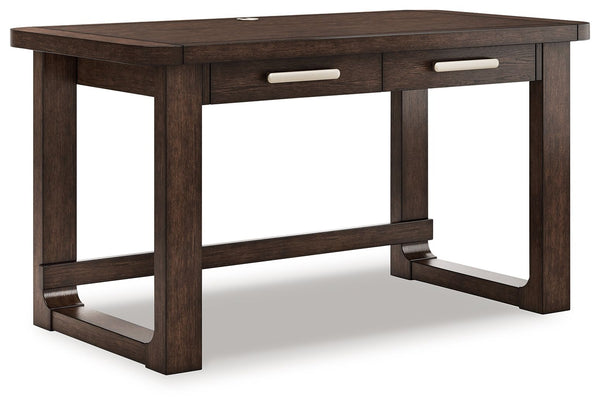 Classic meets contemporary in this home office desk. Its rich, dark wood tone and rounded corners suit todayâ€™s trends while balancing a timeless appeal. And with two storage drawers for work and study essentials, this desk gives your office a dose of bo