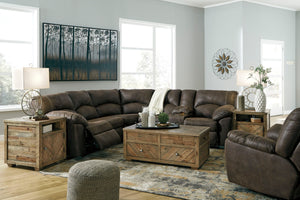 With plush cushions and wraparound pillow top arms, this sectional set takes comfort to a whole new level. Faux vintage leather requires minimal care, making this relaxation station ideal in homes with children and pets. Reclining feature engages with the