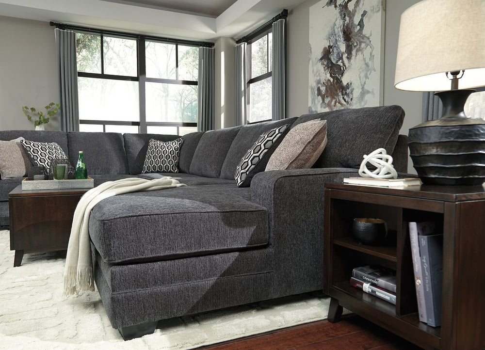 Talk about easy street. This effortlessly chic sectional puts you at the intersection of cool and comfortable. Ultra-deep seats are custom made for afternoon naps and movie night marathons. So plush to the touch, the sectionalâ€™s slate gray upholstery is