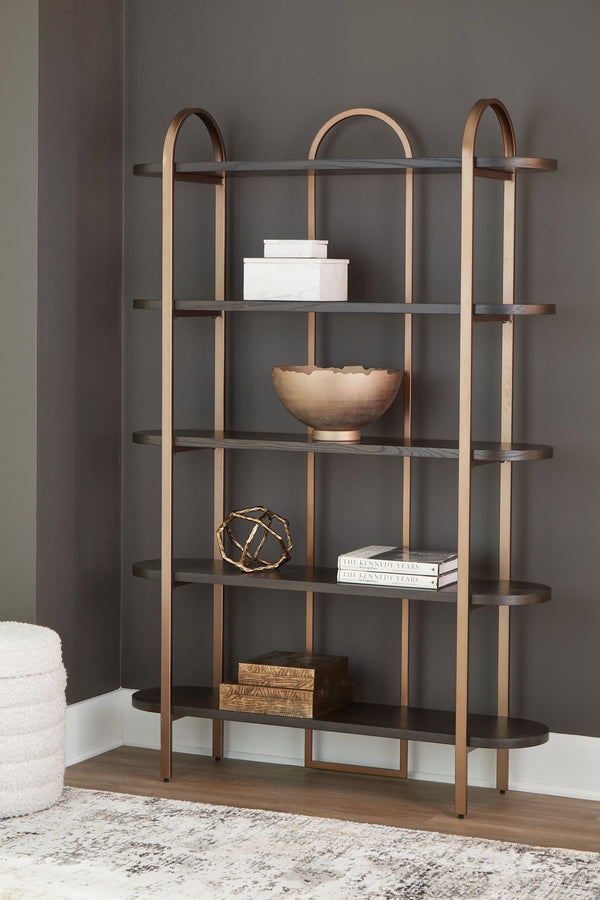  this bookcase seamlessly fits into a wide range of modern settings. Five fixed display shelves in a dark brown finish are balanced by sleek antiqued goldtone metal supports. Offering storage and superior style for books or sh