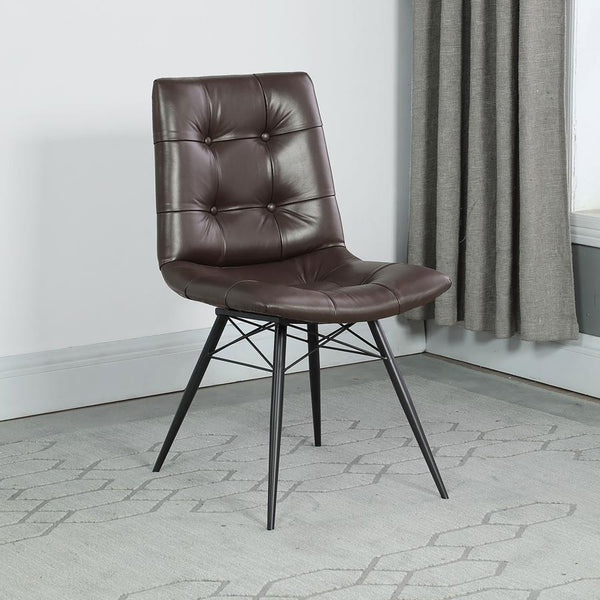  leatherette side chair. The beautiful brown upholstery adds warmth to a room. Decorative button tufting adds a trendy yet tasteful touch. Complete with sleek