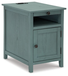 Add big character to a small space with this chairside end table. With its compact size and strong silhouette, it can go anywhere and blend easily into the decor. Less is so much more with the Shaker-inspired design and teal wood tone finish. Loaded with 