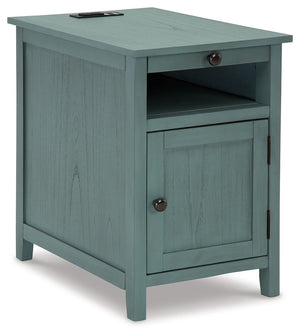 Add big character to a small space with this chairside end table. With its compact size and strong silhouette, it can go anywhere and blend easily into the decor. Less is so much more with the Shaker-inspired design and teal wood tone finish. Loaded with 