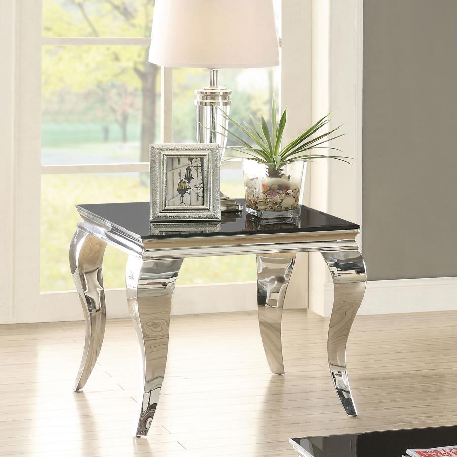 This end table exudes modern glam with a tempered beveled glass top and polished stainless steel cabriole legs. The reflective finish and gracefully curved Queen Anne style legs deliver timeless elegance and a majestic ambiance, perfect for elevating refi