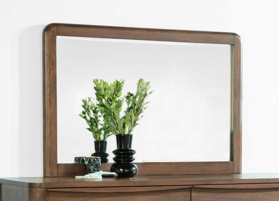 Upgrade your dresser with a matching framed mirror. It-'s a handsome presentation that features rounded open corners on a walnut veneer frame with subtle grain details that add approachable style. The mirror is a horizontal presentation, adding airy light