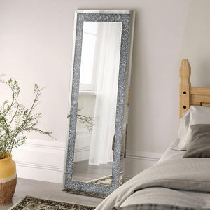  designed to impress from every angle. Its rectangular shape is framed with sparkling silver rhinestone accents and bordered by sleek mirrored trim. Ideal for bedrooms