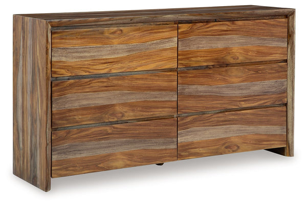 Discover something extraordinary with this clean-lined dresser. The rich natural beauty of the wood, enhanced with a clear wood-tone finish, brings an organically stunning vibe to your bedroom. Strikingly simple drawers lend a hand with keeping your wardr