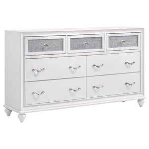 Stylish and ultra-glam, this modern dresser really stands out. The top drawer fronts are covered in sparkling acrylic panels for a stunning infusion of shine. Faceted crystal hardware takes elegance to the next level. Dainty turned feet add a classic elem
