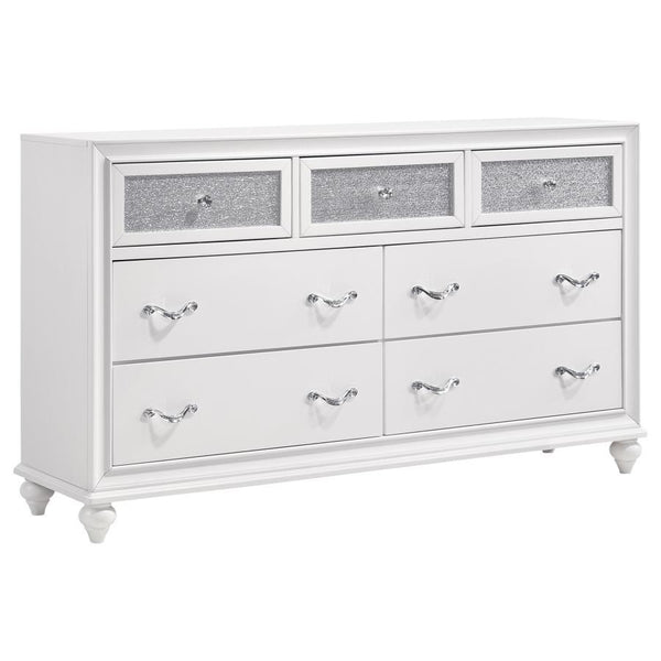 Stylish and ultra-glam, this modern dresser really stands out. The top drawer fronts are covered in sparkling acrylic panels for a stunning infusion of shine. Faceted crystal hardware takes elegance to the next level. Dainty turned feet add a classic elem