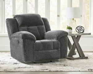  this extra-spacious recliner is a masterclass in accessible style. Plush