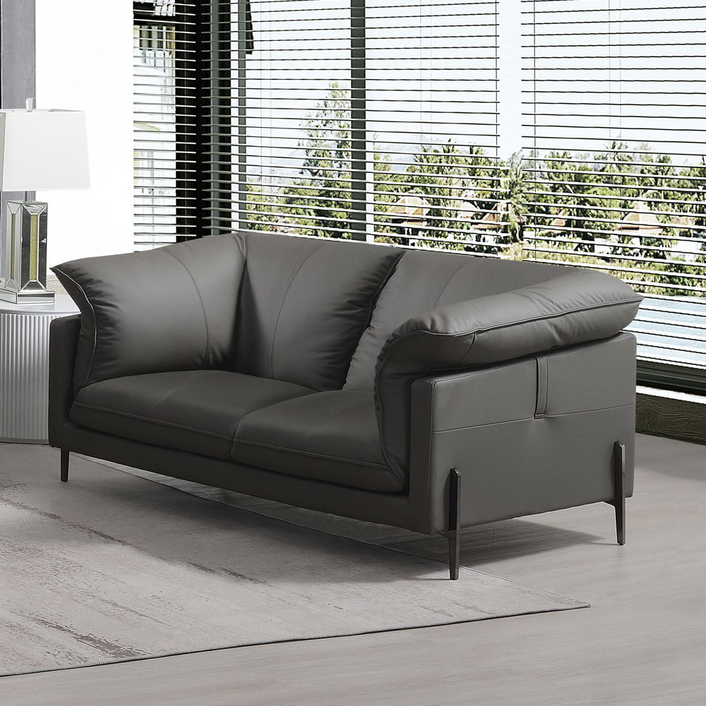 Tadi collection sofa in black leather exudes modern elegance and sophistication. With its clean lines and plush seating, it offers a perfect blend of comfort and style. Ideal for contemporary living spaces, the Tadi sofas provide a luxurious feel, making 