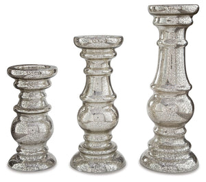 The turned silhouettes of this 3-piece candle holder set create gorgeous negative anywhere in your home. Silvertone finished mercury glass elevates the look with a hint of shine. With candles lit, an enticing aroma fills the air to complement your contemp