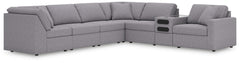 Looking cool and contemporary is great. But when it comes down to it, youâ€™re all about low-maintenance lounging. With the performance fabric on this sectional with audio system, cleaning spills is a breeze. Its customizable modular design caters to your