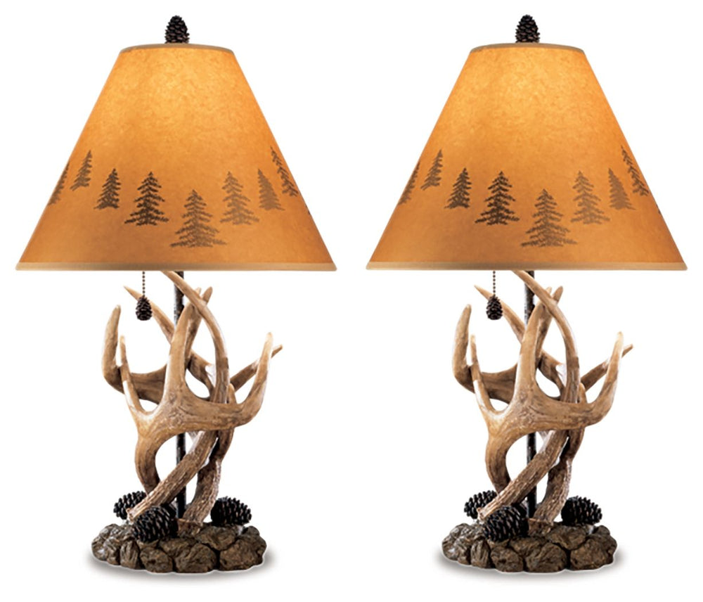 Bring home an upscale touch of mountain retreat style with this richly rustic table lamp. Amazing how a rugged mix of rock, antler and pinecone accents looks so beautifully refined in the right setting.<br><br><b>Additional Dimensions</b><br><ul><li>Shade