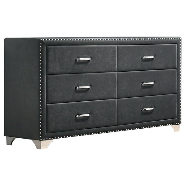 Give outdated sleeping spaces a facelift with this eye-popping and elegant dresser. Entirely upholstered in velvet, this dresser is a conversation starter. It is equipped with six spacious drawers to store your bedside items. Nail head trim makes a specta