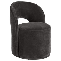 This contemporary swivel accent chair blends style and comfort, featuring luxurious velvet upholstery. Its curved silhouette and 360-degree rotation enhance versatile seating arrangements. Perfect for a living room corner or reading nook, it creates a plu