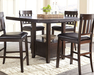  beautifully served. This counter height extension table raises the bar with a simply striking design and rich