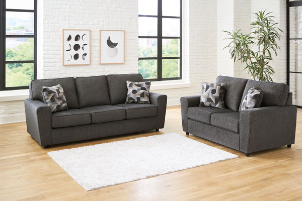 Revamp your sleekly styled living room sanctuary with this sofa and loveseat. Well-suited to contemporary spaces with a calming neutral upholstery in slate gray, it makes a subtle design statement in your space whether youâ€™re hosting guests or enjoying 