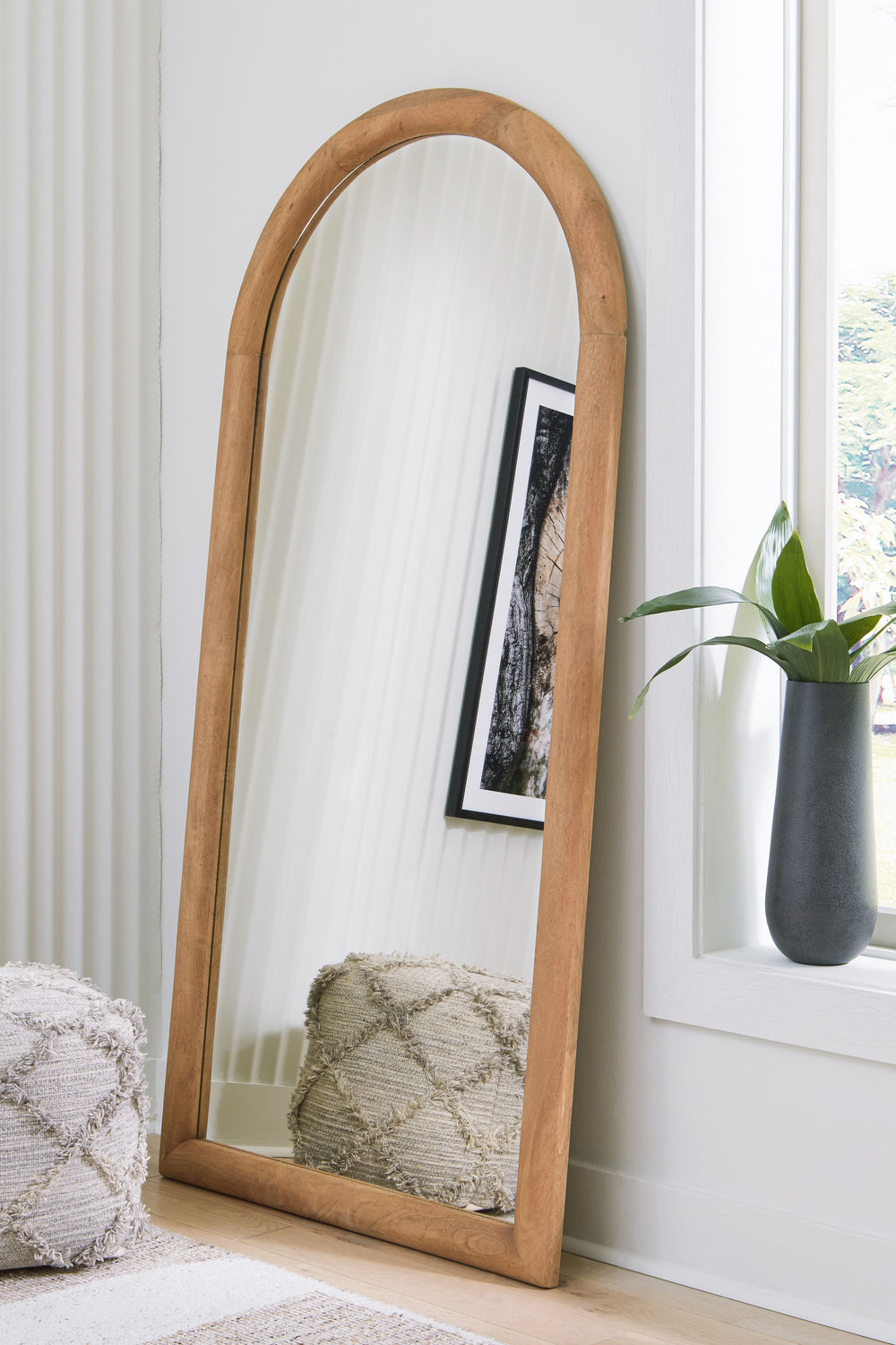 This floor mirror combines effortless beauty and design with carefree function. It brings both height and light to your space, with its naturally beautiful wooden frame offering a casually chic appeal. The full-length design upgrades this mirror to an eve