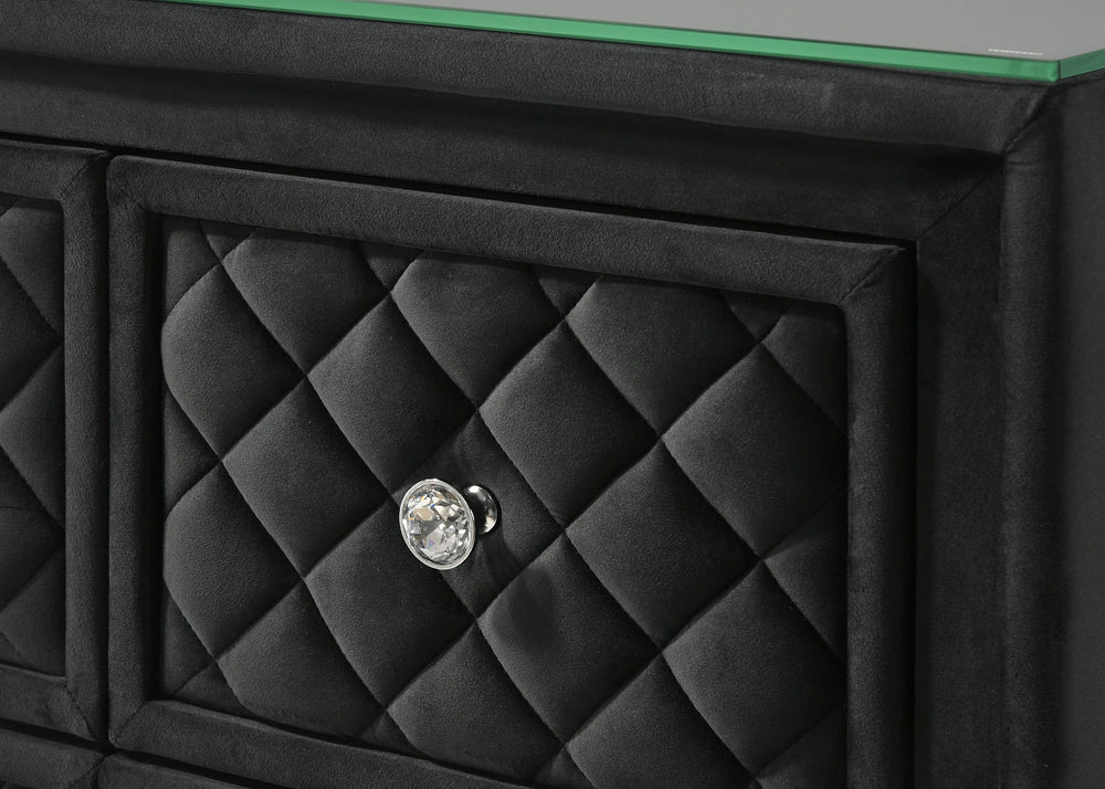 Indulge in timeless elegance and dramatic sophistication with this stunning bedroom collection, designed to make a bold statement. The centerpiece features an exquisitely tufted headboard with luxurious upholstery and intricate nailhead trim, exuding opul