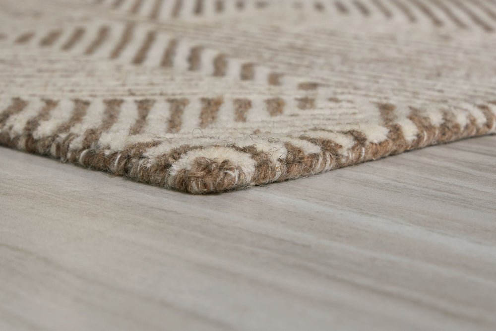 Bring cozy, casual charm to your home. With its hand-tufted geometric pattern, rich texture and captivating two-tone colorway, this area rug brings a modern appeal to every interior.<br/><br/><b>Product Features</b><ul><li>Made of wool and polyester</li><