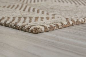  casual charm to your home. With its hand-tufted geometric pattern