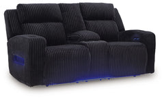 Trend-right style, meet irresistible modern function. Your living room gets a cozy-cool upgrade with the TwinBrooke power reclining loveseat. Curl up in its ultra-chic corded upholstery and recline with one-touch controls. Is it movie night or game time? 