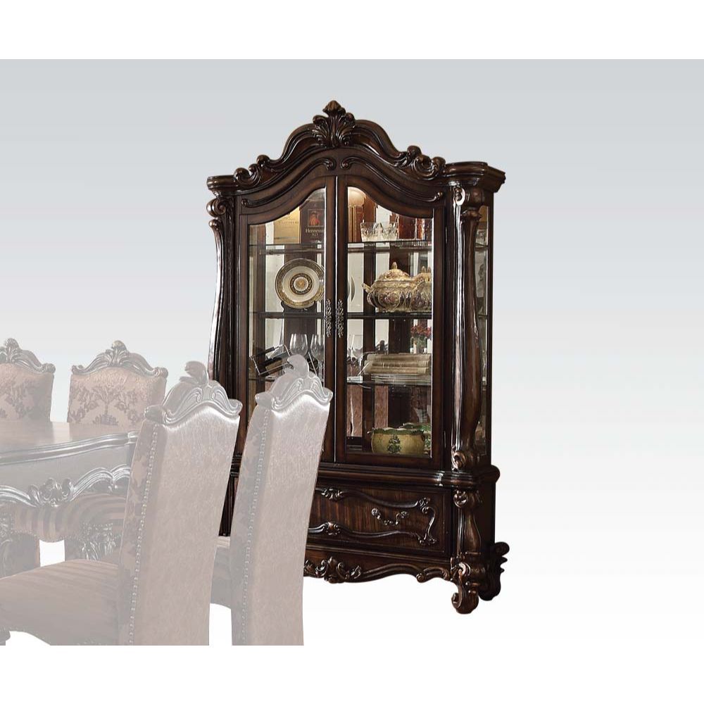 Curio Cabinet Arched Top: Touch Light & 2 Glass Doors (3 Glass Shelves & Back Mirror Inside) Base: 1 Drw Oversized Scrolled Trim, Leaf Crown and Post-Leg (Poly Resin with Antique Contrast Finish) Drawer: GLIDE Side Metal, DT French, Felt-Lined Included<br