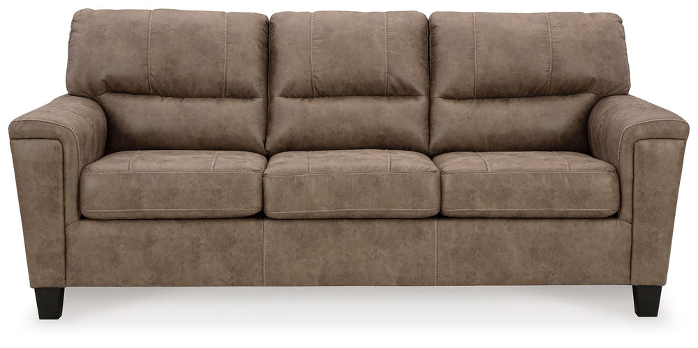 This decidedly modern sofa proves less is more, bringing simply inviting style to your living room. Take the guesswork out of decoratingâ€”its warm faux leather has a universal appeal, pairing with casual and contemporary aesthetics alike. All you need to