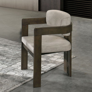 This dining set includes a rectangular table with a fixed top featuring sintered stone and tempered glass. The padded seat and back cushion chairs offer comfort and style. Complementing the set, the two-tone server boasts metal side glide drawers with 2/3