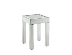 This piece strikes a sleek, clean-lined silhouette accented by faux diamonds and mirrored finish. Adding depth and dimension to your room while upping the wow factor in your home. This Noralie End Table is ideal for displaying your precious family photos 