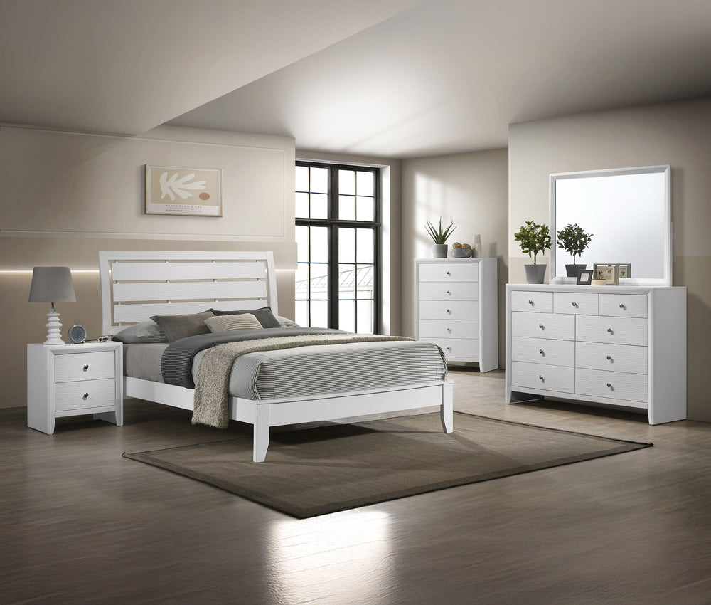 This inviting bedroom set features a refreshing white finish with subtle textural details that add a touch of modernity. The clean-lined bed boasts a distinctive headboard with horizontal slats that create an airy, open feel, promoting relaxation. Complem