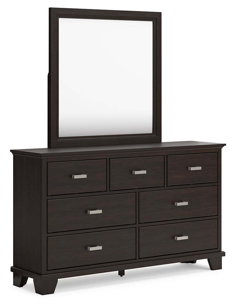 Feast your eyes on this richly versatile dresser with mirror. Its traditional-inspired dark brown finish effortlessly blends with contemporary bright nickel-tone pulls to create a stunning look that-'s not too stuffy or too trendy. Spacious drawers offer 