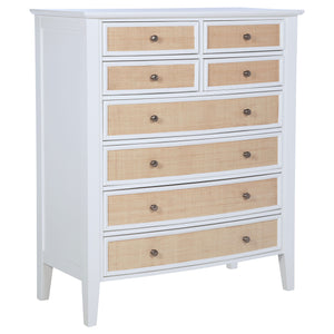 Create ample storage in your stylish bedroom with a modern eight-drawer chest. Its coastal style is established with a cool white finish paired with natural rattan finish accents on its drawer fronts, offering compelling contrast and texture. Eight drawer