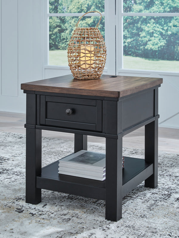  which pairs a warm satin black base with a contrasting butcher block veneer top. A spacious storage drawer and