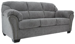 Why sacrifice comfort for style (or style for comfort) when you can have the best of both in this sofa in pewter gray. Elements include a chic divided-back design and pillow top wrapped armrests that make nodding off all too easy. Calling attention to the