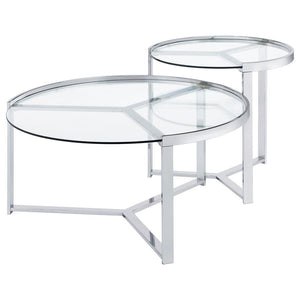  and pleasing. Your living room or family room comes to life with a table set including one large and one small round table that display side by side and nestle together 